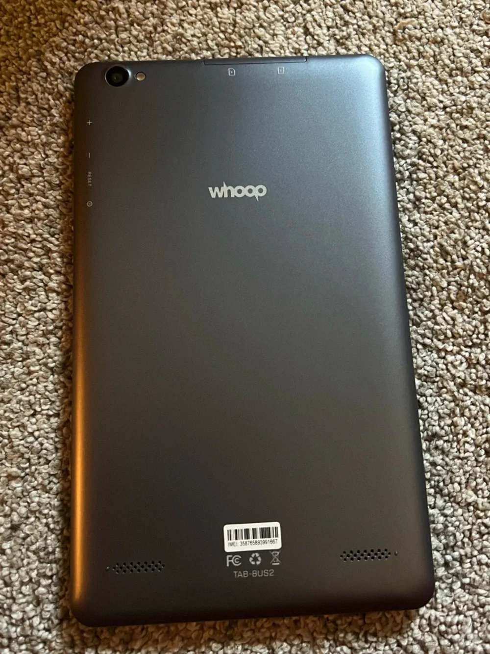 Tablet included with brown leather folio case